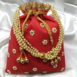 Bridal Collection Red Colour Heavy Potli Bag Exclusive Hand Crafted with Motis & Zaris