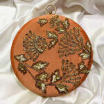 Latest Collection Peach Colour Round Shaped Clutch Exclusive Hand Crafted with Zaris on Reshmi Fabric